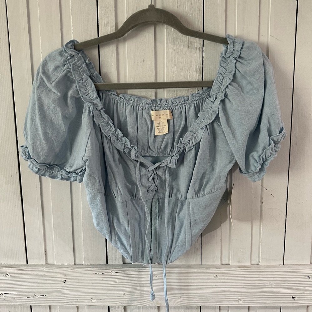High demand top. No longer available in store. NWT ALTARD STATE